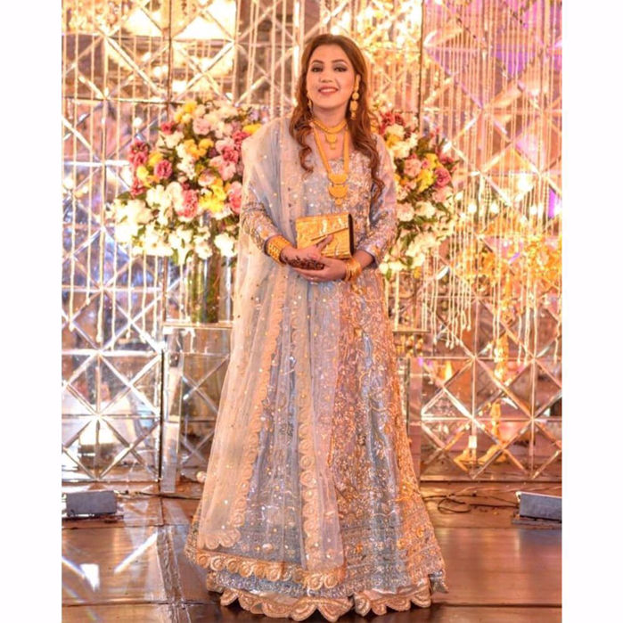 Picture of Our client Kiran Naveed puts togather ultimate elegence and grace by chosing this heavily embellished gown paired with a mukesh dupatta.